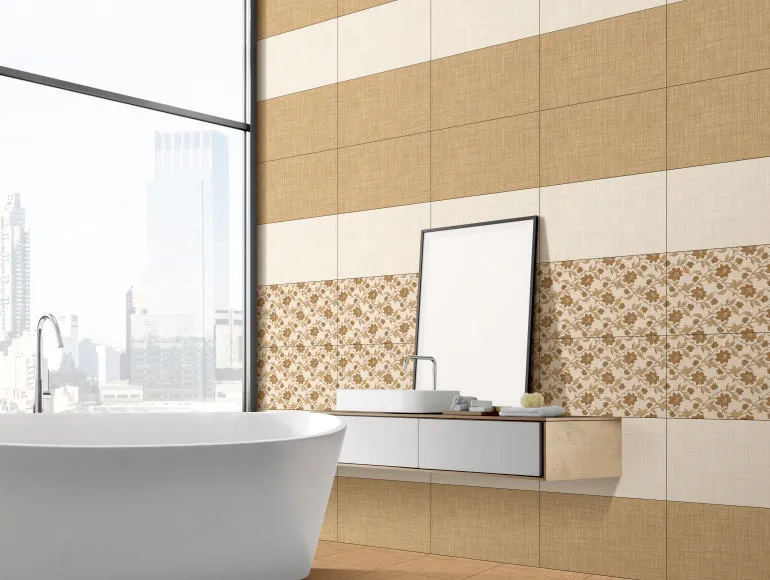 Sleek beige bathroom design with ODG Vimal Brown tiles, sink with mirror, and bathtub